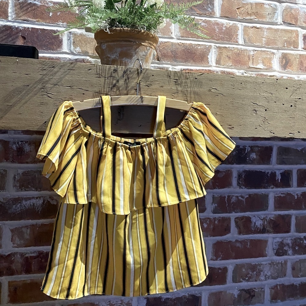 Takara girls from Dillards. Can be off shoulder or up.